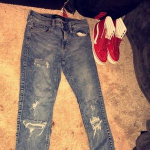 Distressed denim jeans
